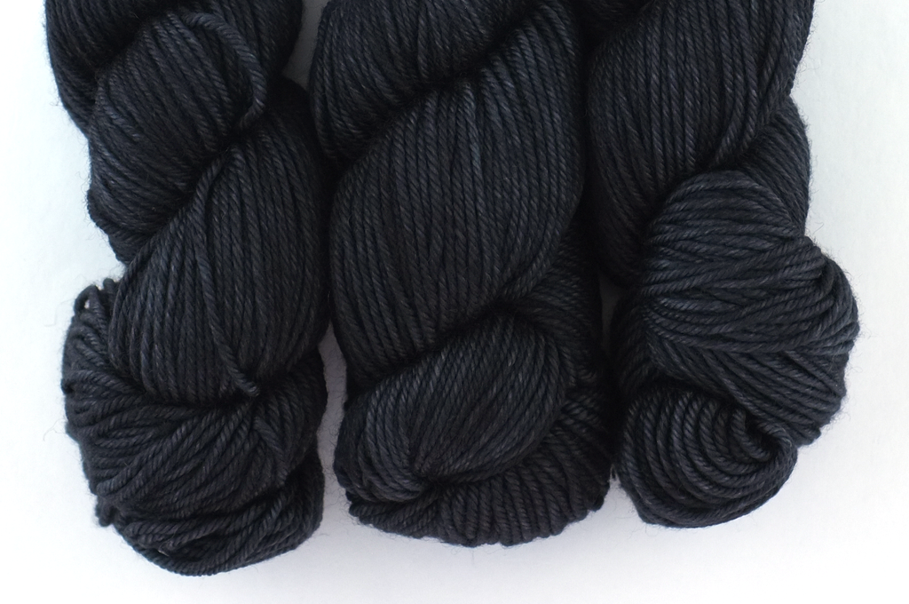 Dream in Color Classy color Black Pearl 002, worsted weight superwash wool knitting yarn, deep charcoal gray semi-solid by Red Beauty Textiles