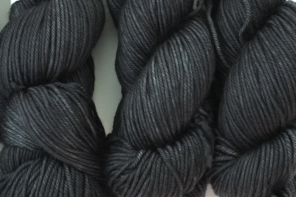 Dream in Color Classy color Black Pearl 002, worsted weight superwash wool knitting yarn, deep charcoal gray semi-solid by Red Beauty Textiles