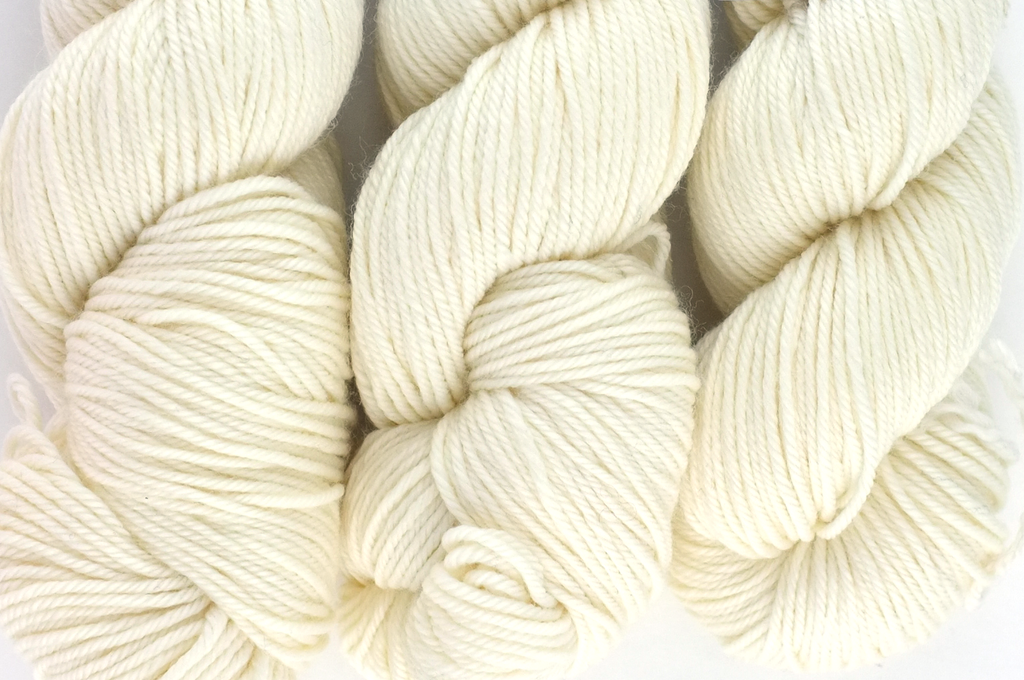 Dream in Color Classy color Crying Dove 001, worsted weight superwash wool knitting yarn, off-white, natural semi-solid