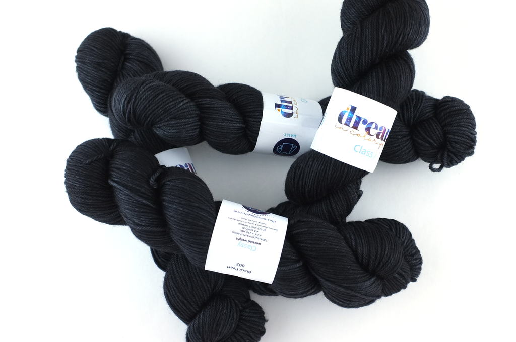 Dream in Color Classy color Black Pearl 002, worsted weight superwash wool knitting yarn, deep charcoal gray semi-solid