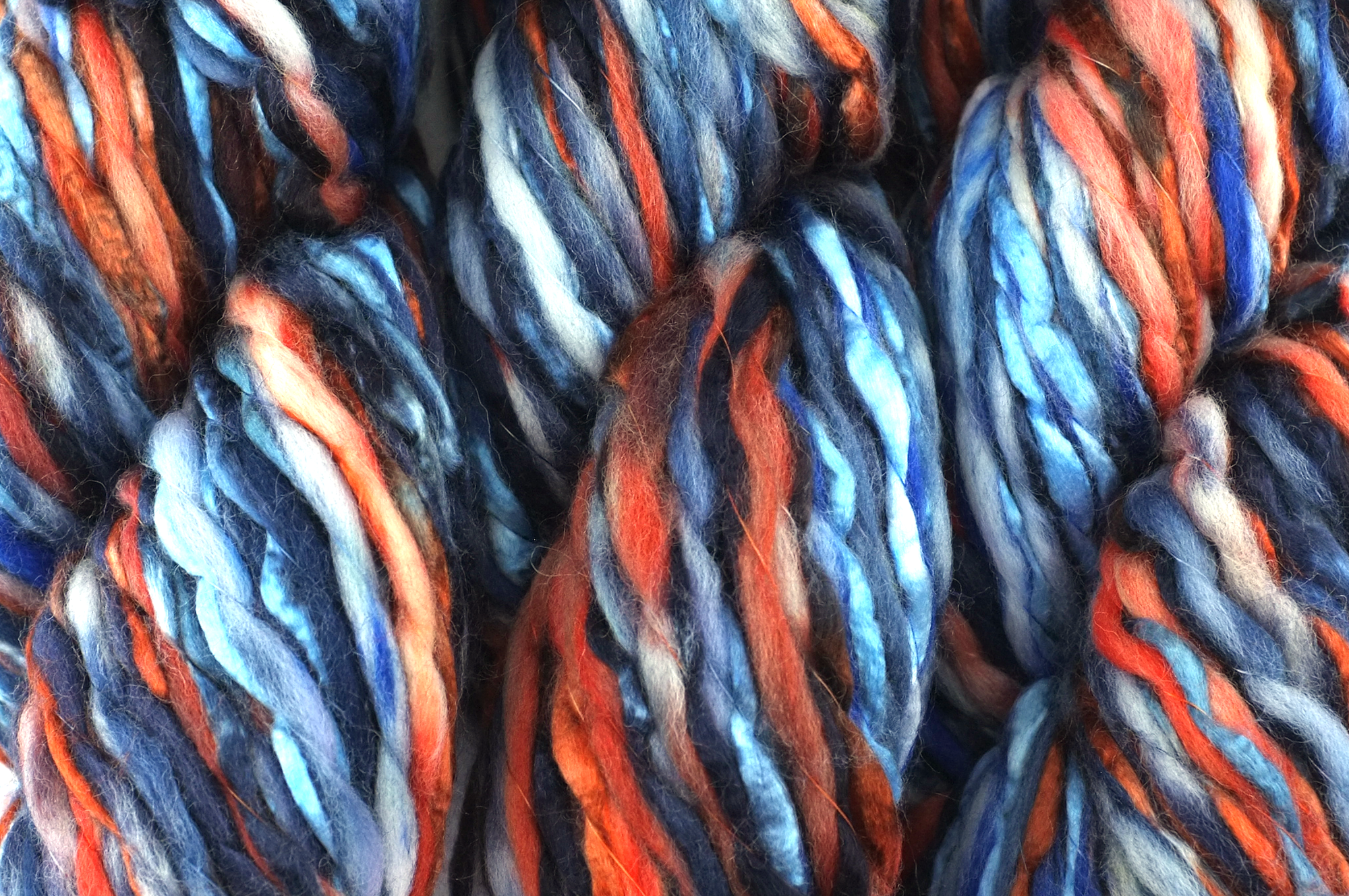 Super Bulky weight Enorme in Twilight 15, orange, blue, black, wool blend yarn by Louisa Harding by Red Beauty Textiles