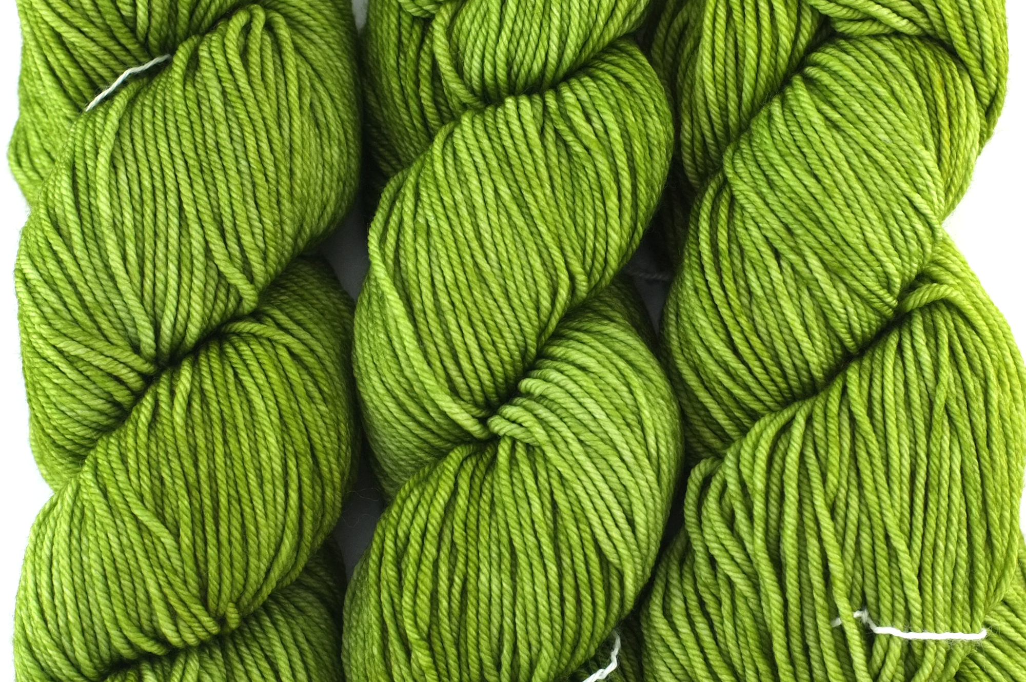 Malabrigo Rios yarn, color Lettuce, bright lettuce green, #037, superwash merino worsted weight knitting yarn by Red Beauty Textiles