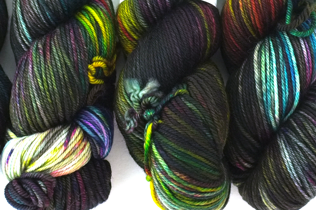 Dream in Color Classy color Charcoal Prismatic 574, worsted weight superwash wool knitting yarn, rainbow with dark gray