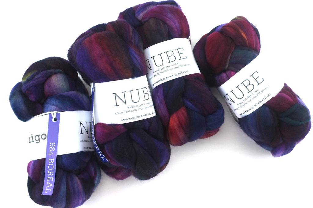 Malabrigo Nube, Boreal, dark rainbow, magenta, navy, color 884, merino spinning fiber by Red Beauty Textiles
